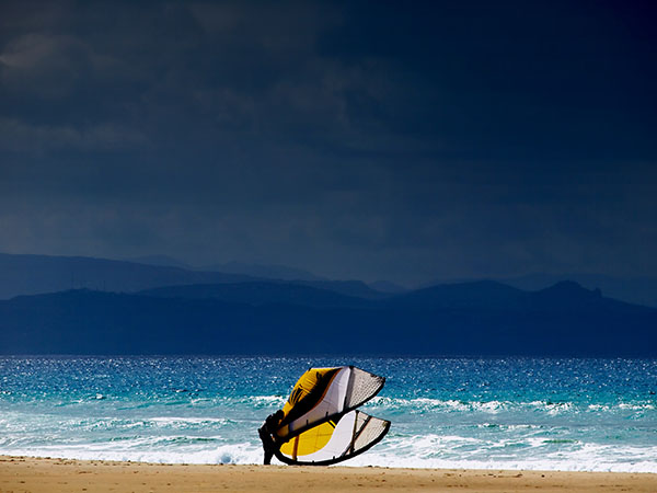 Kitesurfer on a winterday in Tarifa, Spain